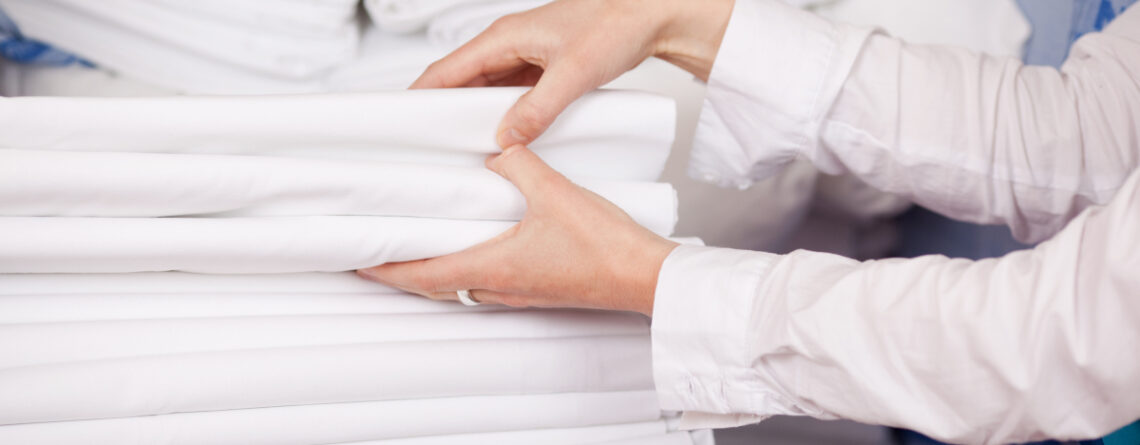 Freshly pressed bed linen as an example of a linen store for TDS Commercial blog